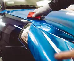 image of a pro installing a vehicle wrap