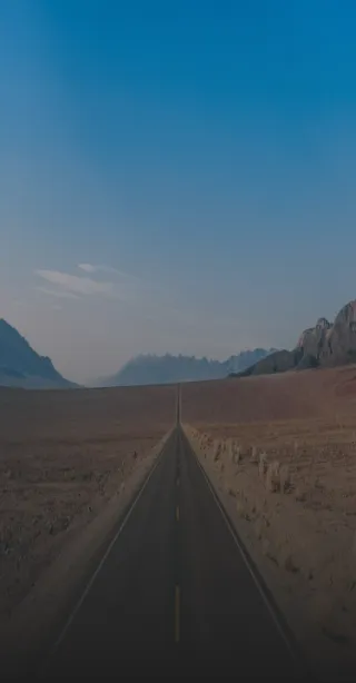 image of a long desert road