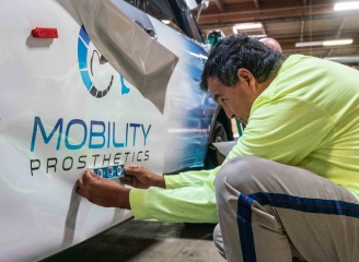 technician applying a new wrap